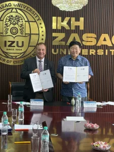 Frank and IKH president signing Mongolia 225x300 jpg